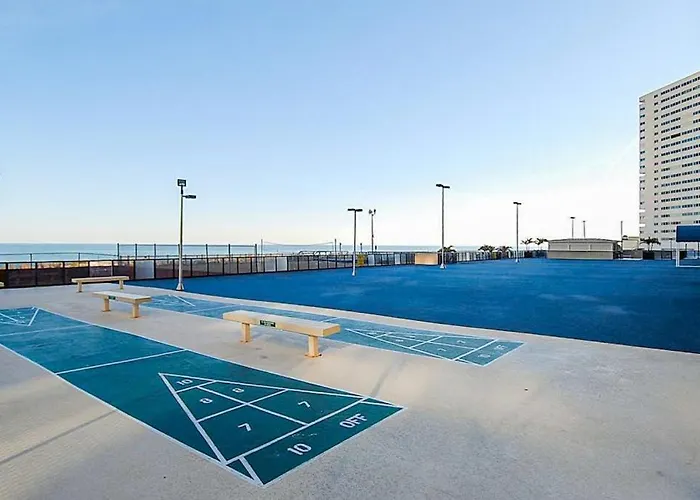 Holiday home Cozy Beachfront With Balcony Ac Pools Game & Gym